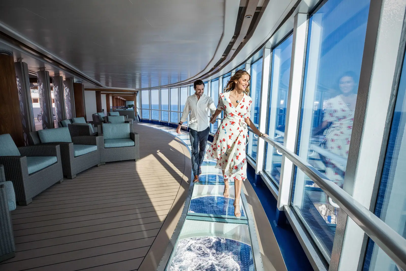 Discovery Princess Makes Maiden Call To Singapore And Sets Sail on Five-Day Malaysian Cruise 11 Couple walking on the glass SeaWalk aboard Discovery Princess cruise ship