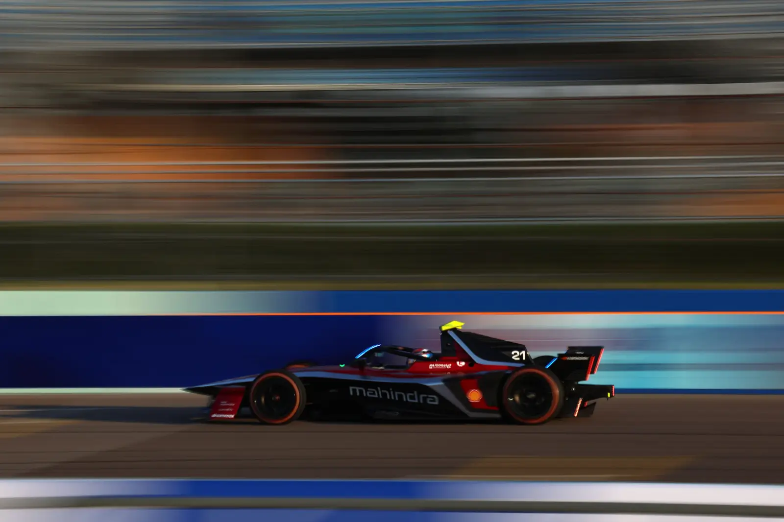 Free Access To Formula E Pre-Season In Valencia 2 Mahindra Formula E car racing on track during pre-season testing.