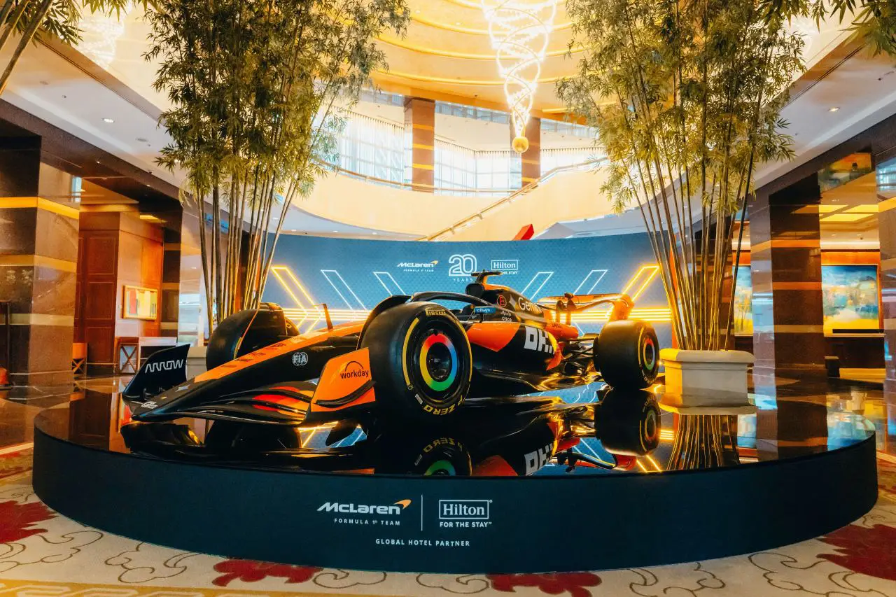 Travelers In Asia Pacific Keen To Plan Trips Around Major Sporting And Music Events 6 McLaren Formula 1 car on display in a Hilton hotel lobby celebrating 20 years of partnership between Hilton and the McLaren F1 Team.