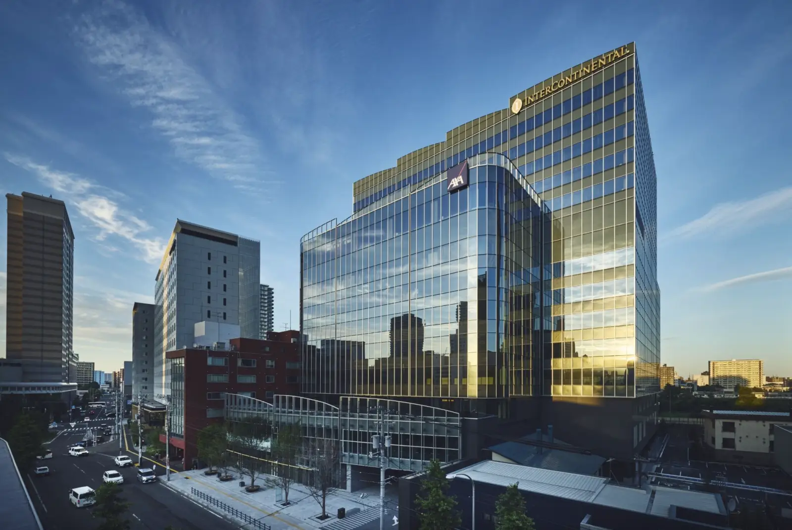Exterior view of InterContinental Sapporo in Hokkaido, Japan, a modern glass-fronted luxury hotel building in the Lilac Square complex