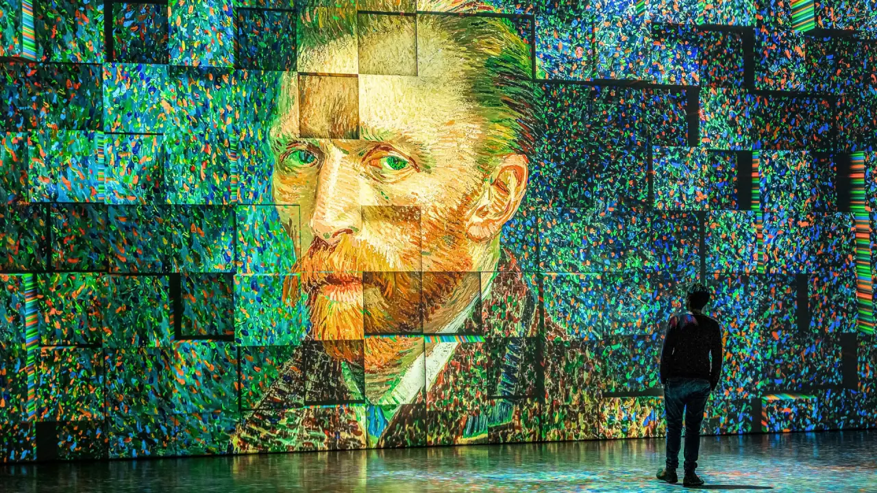 55,000 Visit Istanbul’s Van Gogh Digital Exhibition 2 Visitor viewing a large digital projection of Vincent van Gogh’s self-portrait at an immersive exhibition in Istanbul