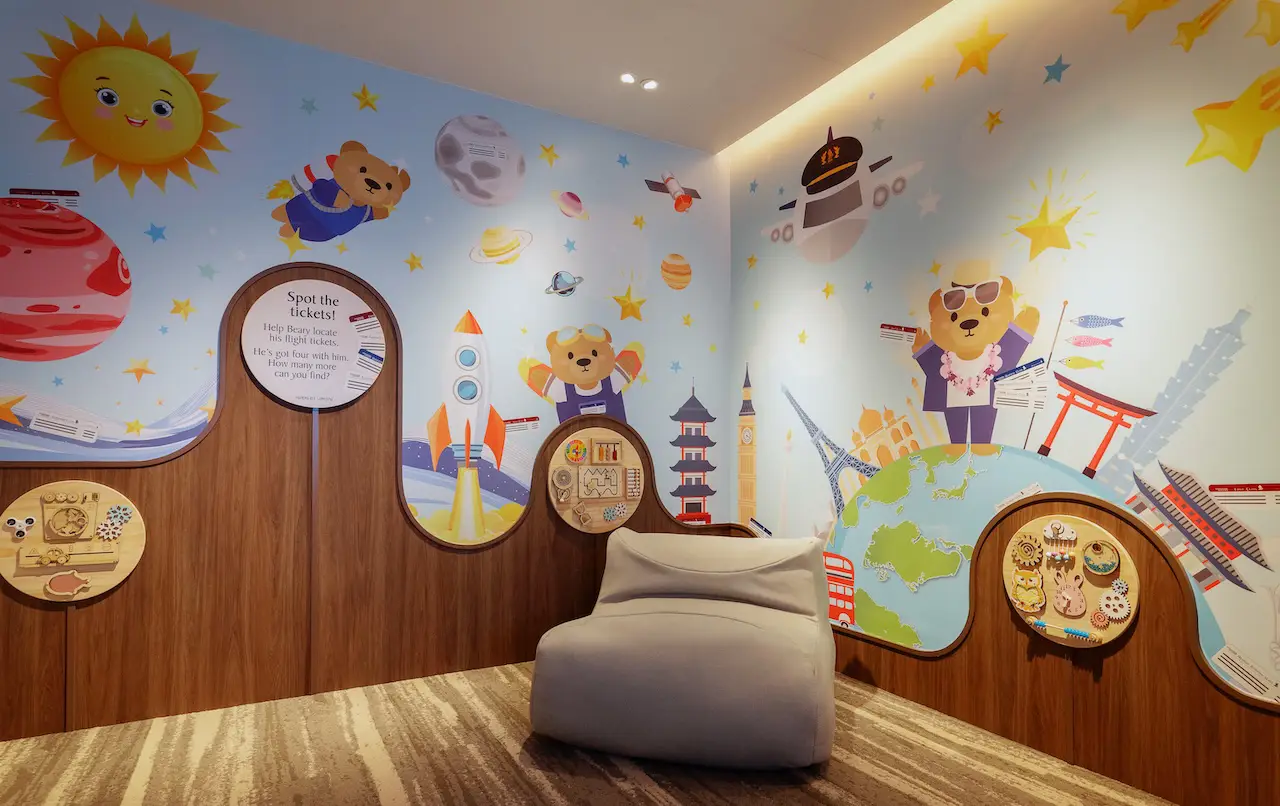 Singapore Airlines Unveils New First Class Silver Kris Lounge At Changi Airport 5 Children’s playroom in Singapore Airlines’ First Class SilverKris Lounge at Changi Airport, decorated with travel-themed wall art and interactive toys.
