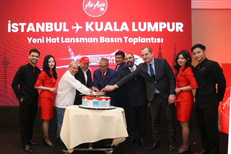 AirAsia X executives and officials cutting a ceremonial cake during the launch event for the new Istanbul–Kuala Lumpur route.