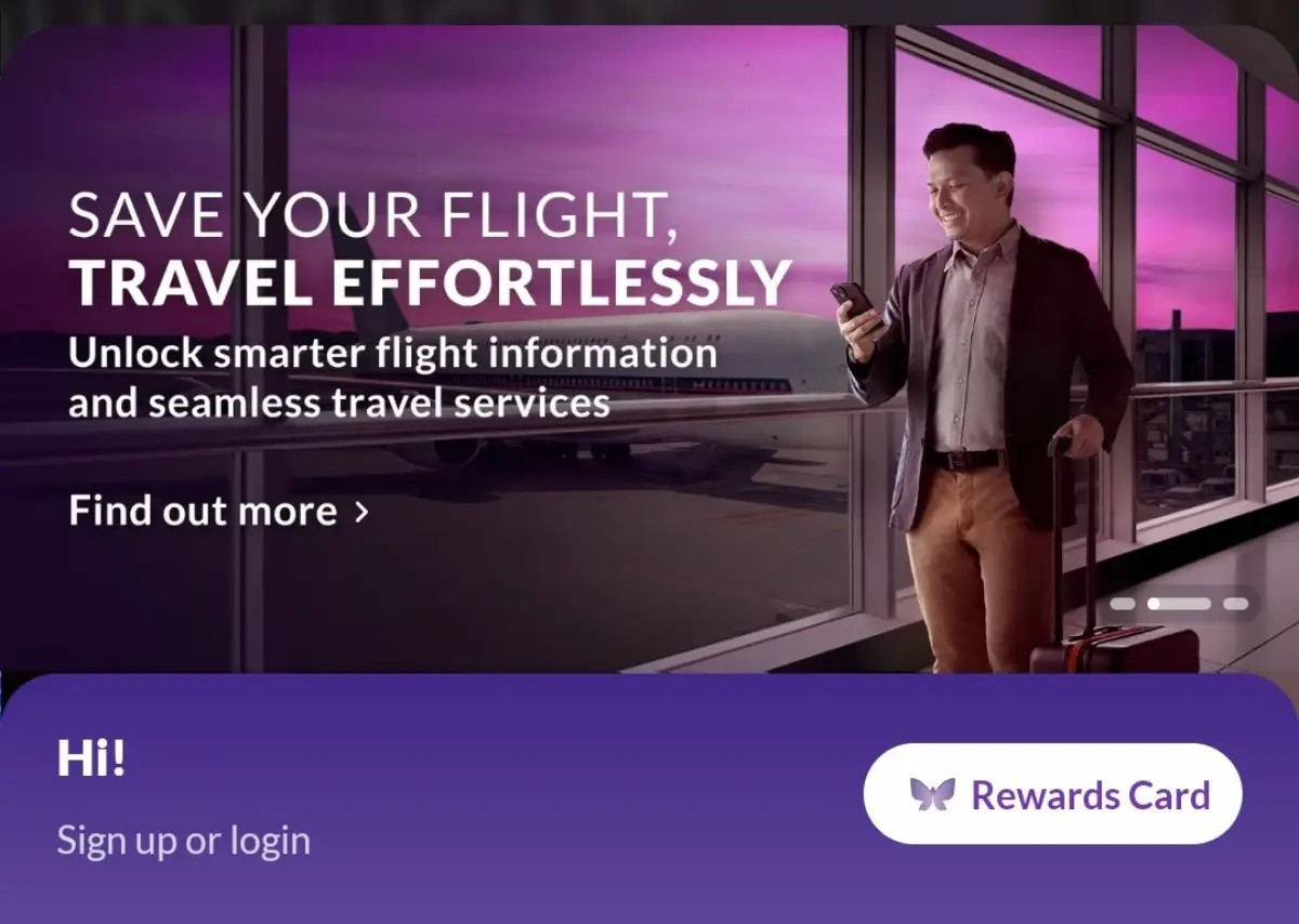 Traveler checking phone near airport window with Changi App screen showing “Save Your Flight, Travel Effortlessly” message.