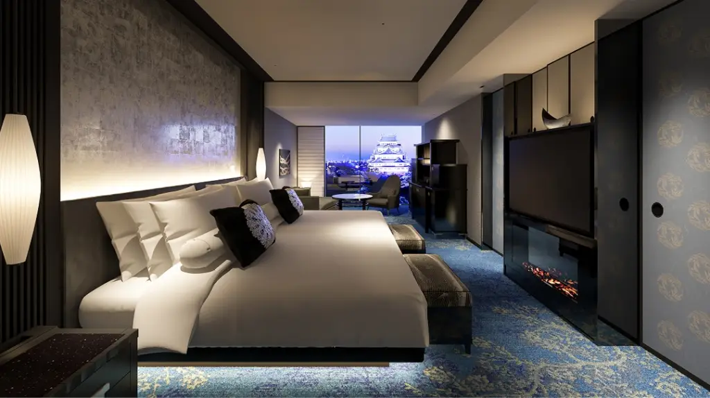 Espacio Nagoya Castle Offers Ultra-Luxurious Samurai-Era Accommodation 3 Luxurious guest room at ESPACIO Nagoya Castle with castle views through floor-to-ceiling windows.