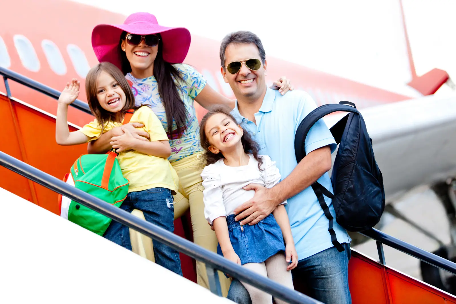 How Indian Smes Cut Trip Risk &Amp; Costs: A Cfo’s Playbook To Buy Travel Insurance Online 2 Happy family boarding airplane for vacation travel