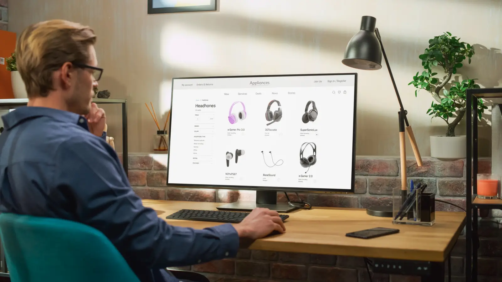 Man shopping online for headphones on a desktop computer at home.