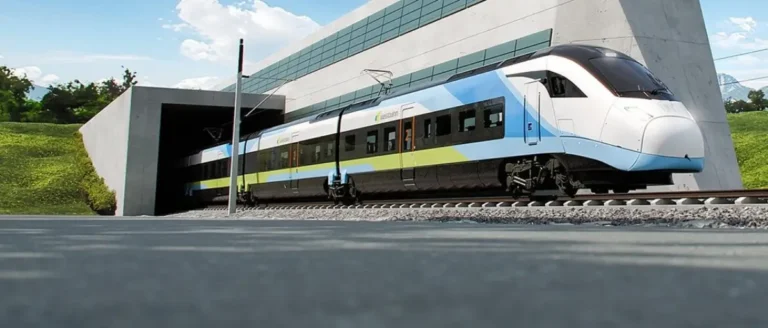 Westbahn high-speed train emerging from a tunnel on an Austrian rail line