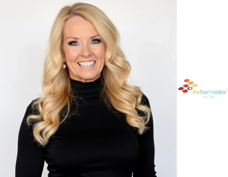 Angela Hughes smiling in a professional portrait, standing against a white background with The Travel Institute logo to the right.