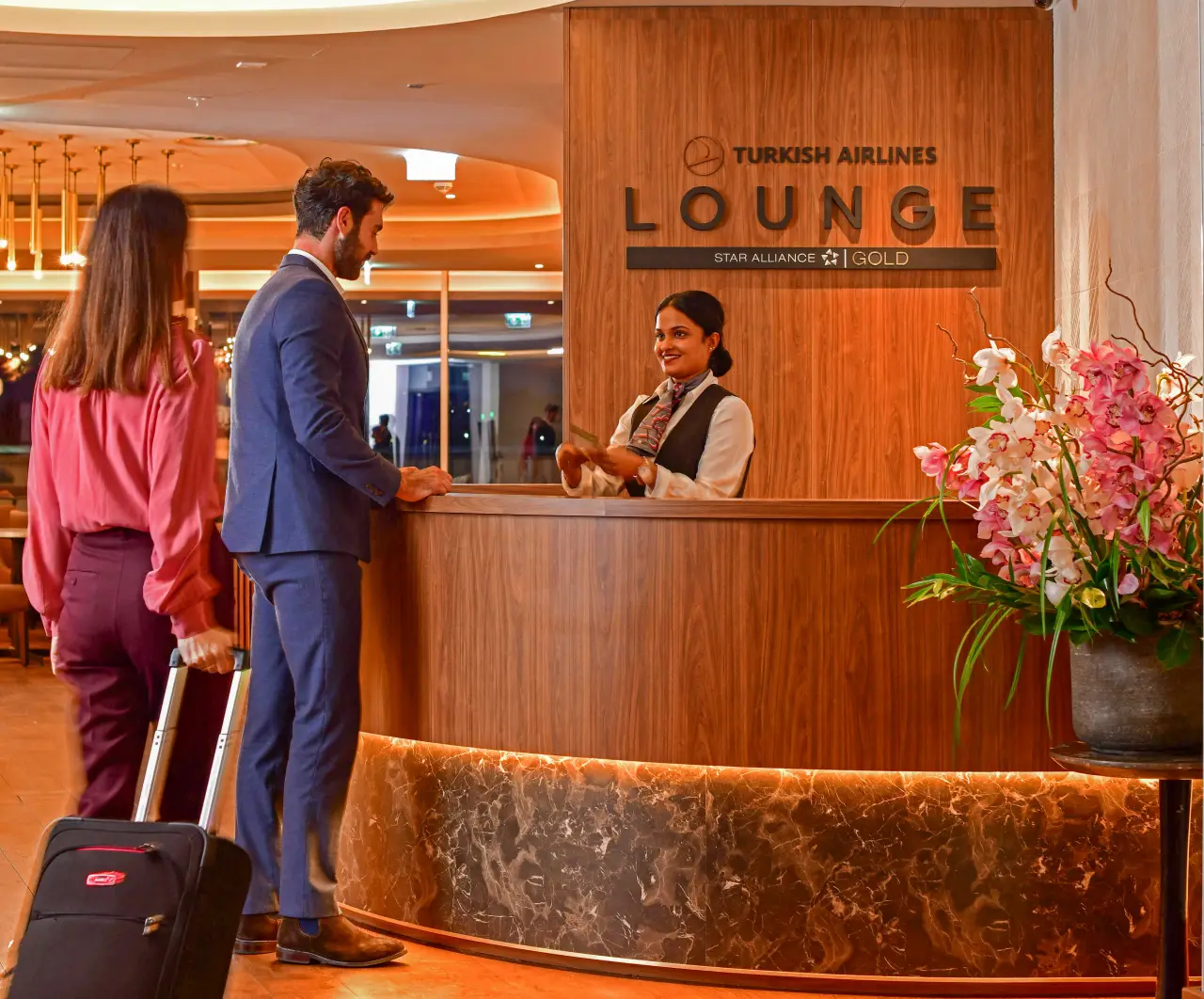 Passengers check in at the Turkish Airlines Lounge reception at Edinburgh Airport