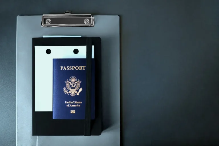 Technology 9 US passport placed on a notebook and clipboard, symbolising digital identity and modern travel documentation