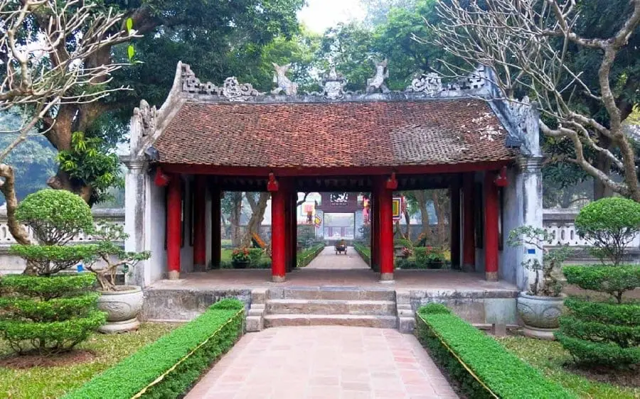Temple Of Literature In Hanoi Showcases Vietnam’s Ode To Academic Excellence 4 The Great Middle Gate at the Temple of Literature in Hanoi, marking the ceremonial entrance to the first courtyard with red columns and tiled roof.
