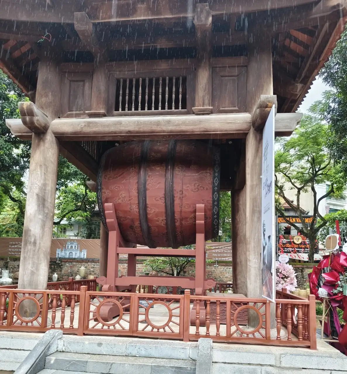 Temple Of Literature In Hanoi Showcases Vietnam’s Ode To Academic Excellence 8 Giant traditional drum housed in a wooden pavilion at the Temple of Literature in Hanoi, symbolising ceremonial music and respect for Confucian scholars.