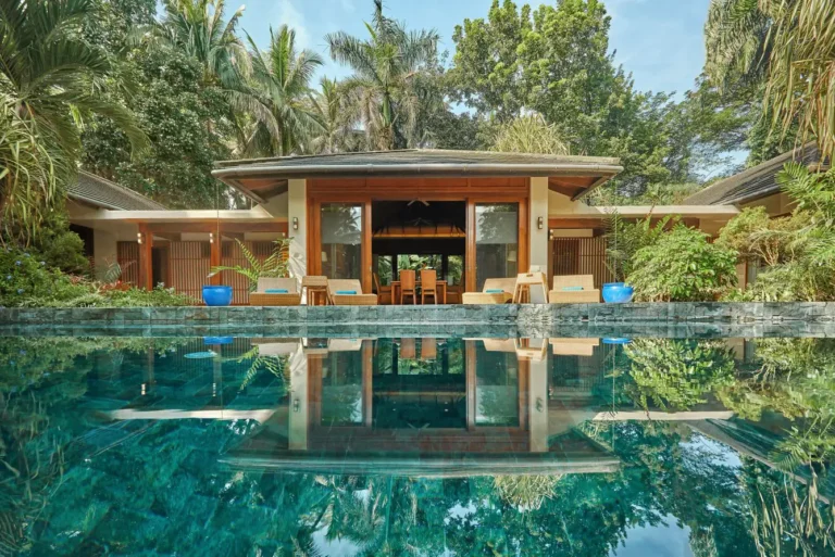 Luxury Travel 49 Private pool villa surrounded by tropical greenery at a luxury wellness resort in the Philippines.