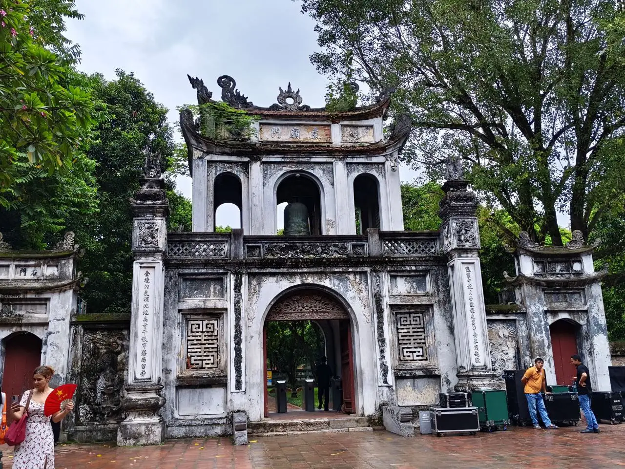 Temple Of Literature In Hanoi Showcases Vietnam’s Ode To Academic Excellence 3 Main entrance gate of the Temple of Literature in Hanoi, featuring traditional Vietnamese architecture, stone carvings, and a bronze bell above the archway.