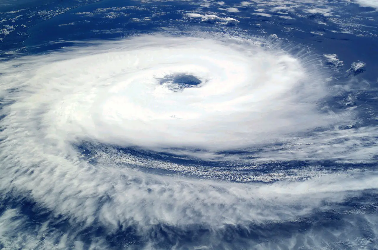 Satellite view of a powerful hurricane with a well-defined eye over the Atlantic Ocean