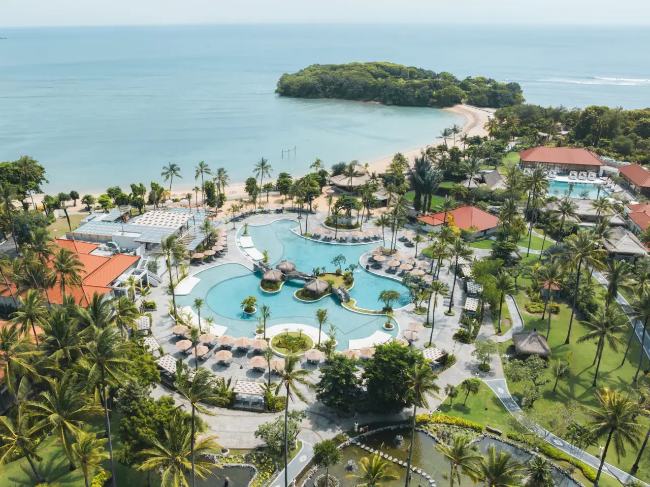 Aerial view of Paradisus by Meliá Bali resort in Nusa Dua with lagoon-style pools and beachfront setting
