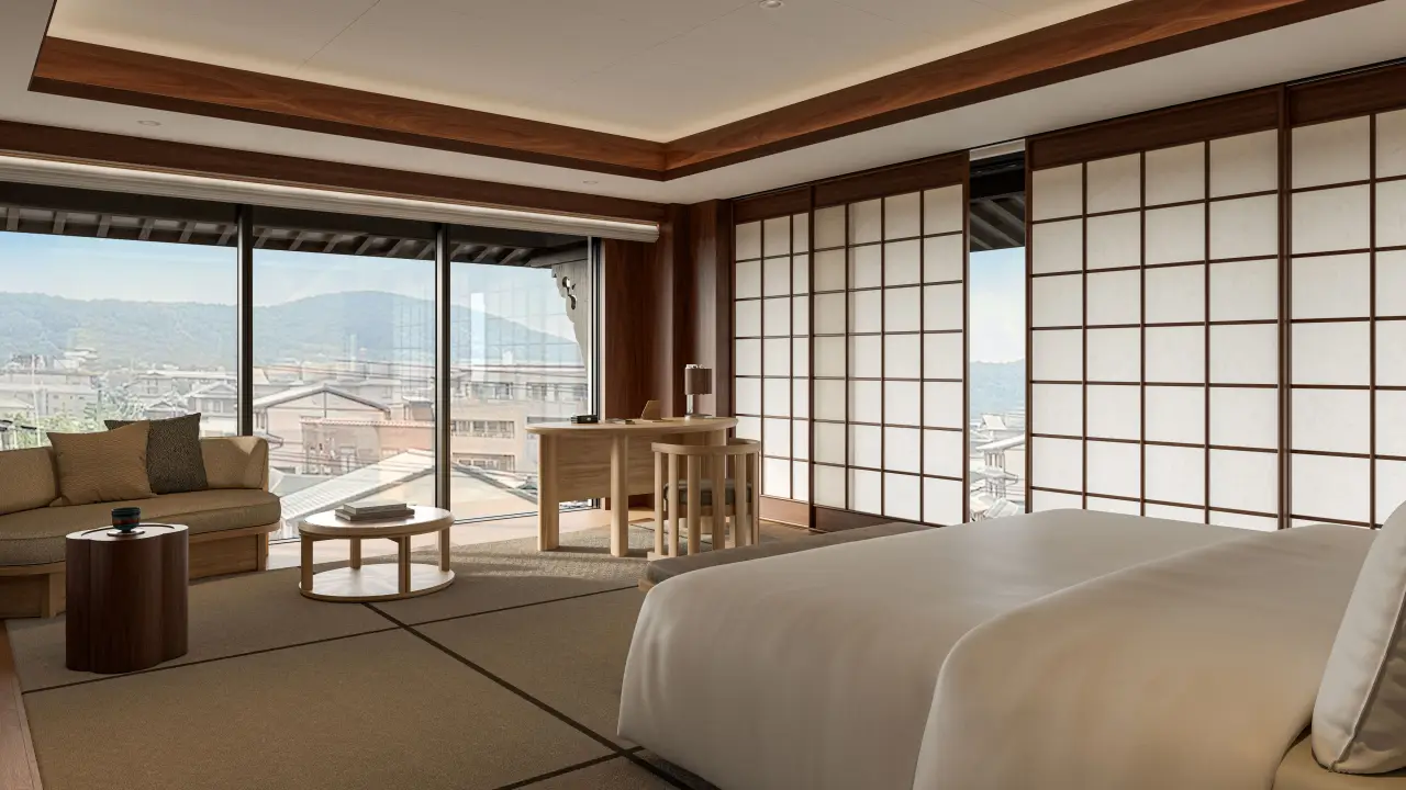 Luxury tatami-style suite at Capella Kyoto with shoji screens, low wooden furniture and panoramic city and mountain views