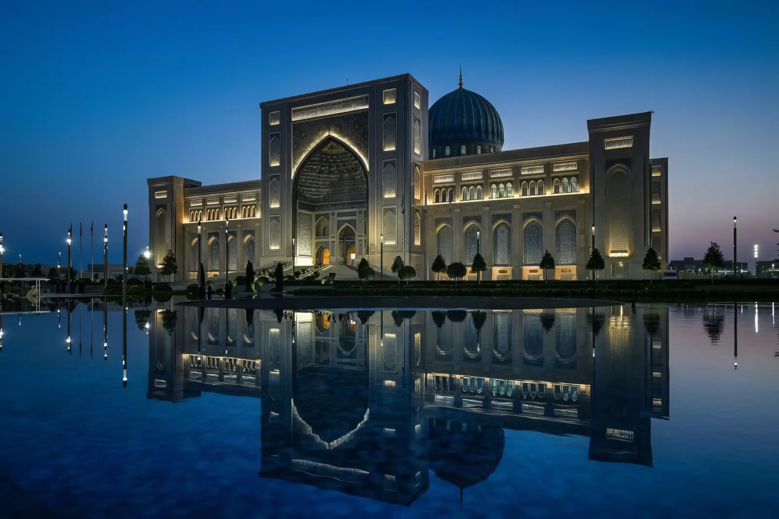 Islamic Civilization Center in Tashkent illuminated at night with reflection in water