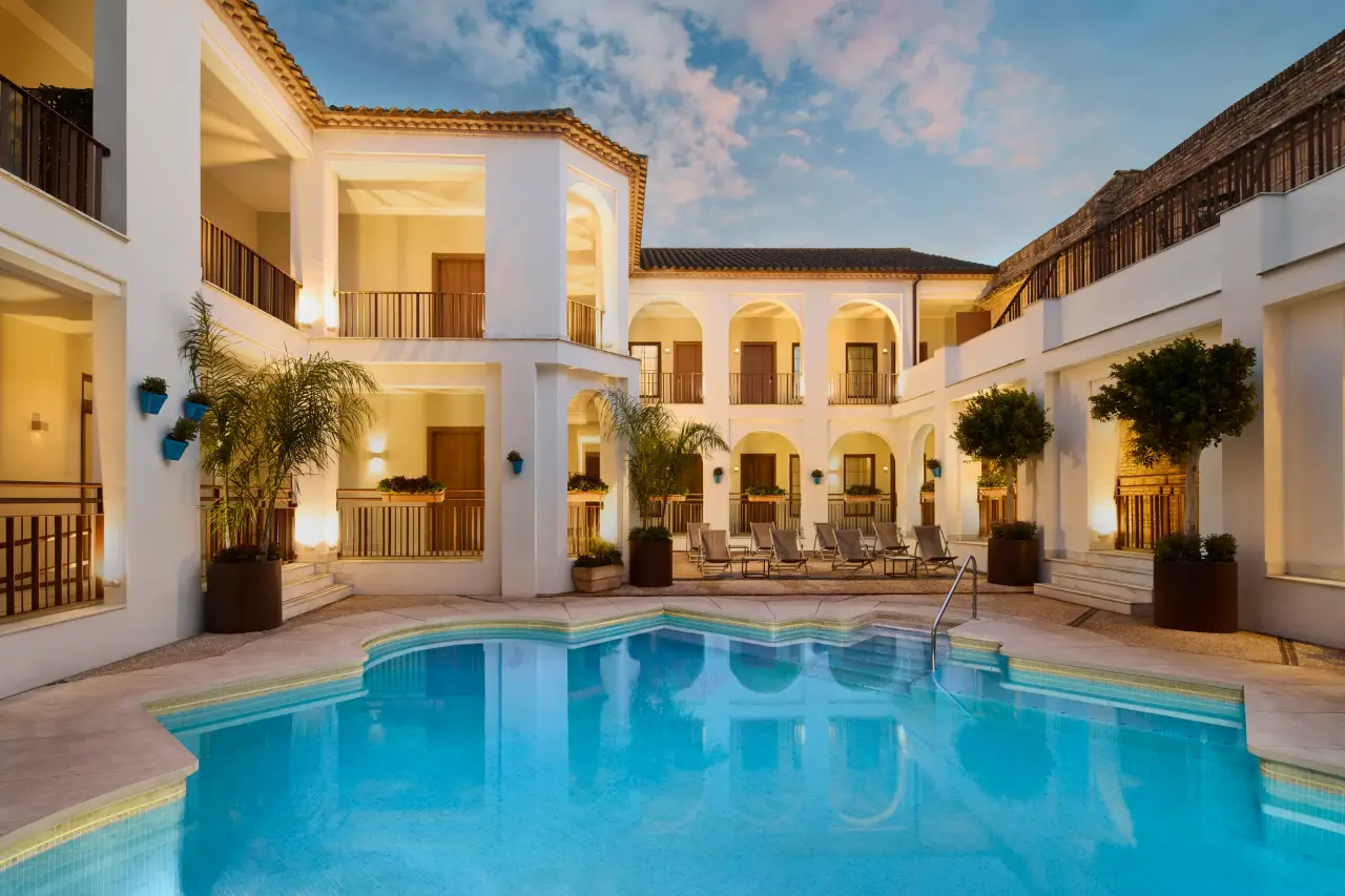 Luxury courtyard pool at NH Collection Palacio de Córdoba in historic Jewish Quarter