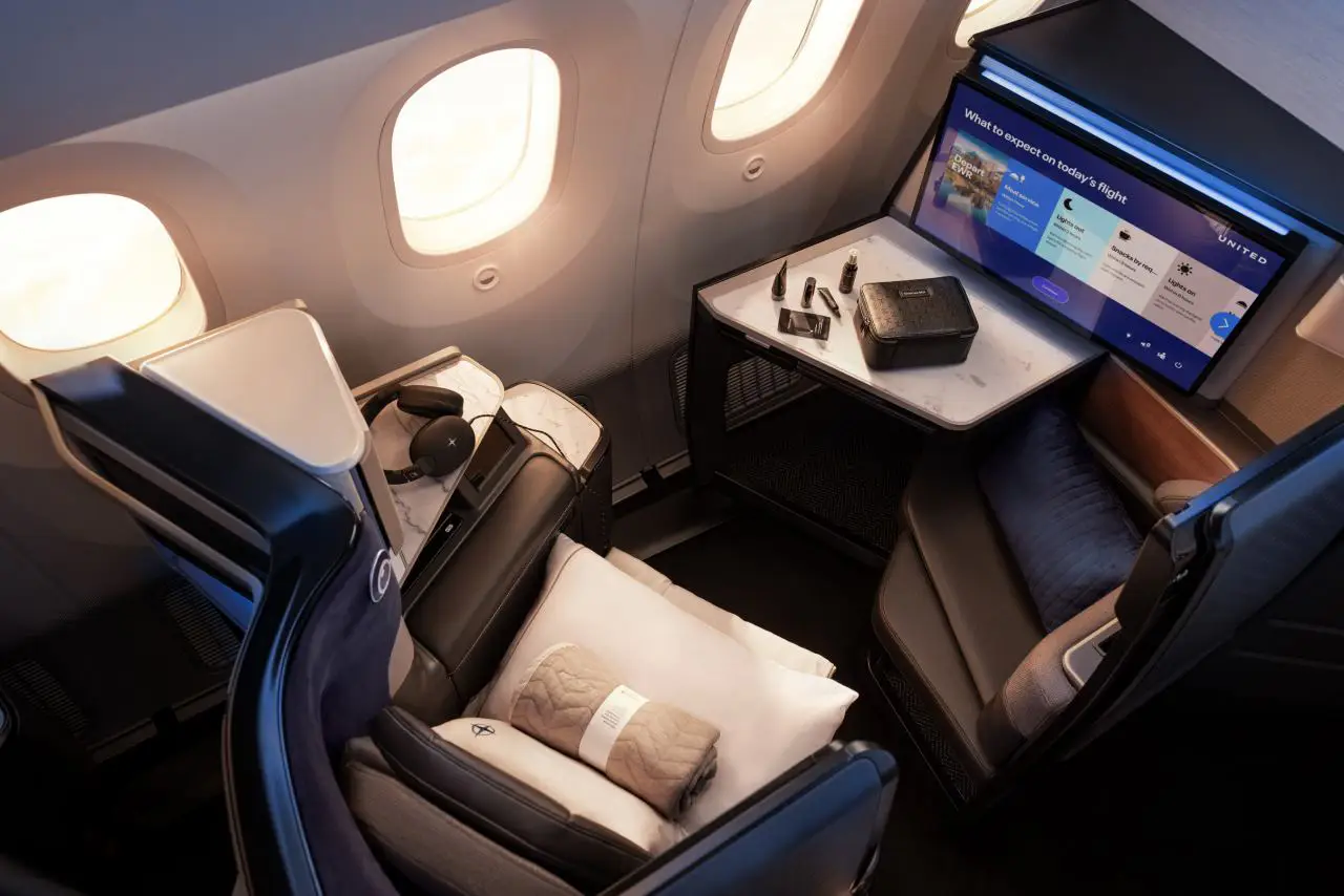 United Polaris Studio suite on a Boeing 787-9 with lie-flat seat, large screen and private workspace