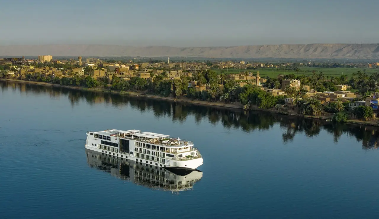 Viking Nile River cruise ship sailing near Luxor along the Nile River in Egypt