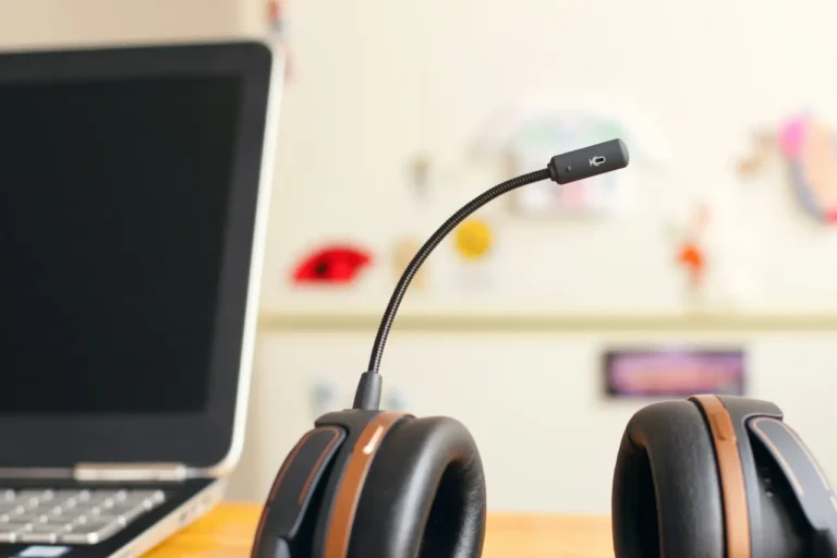 Technology 8 Customer service headset with microphone next to laptop for AI travel agency support and online communication