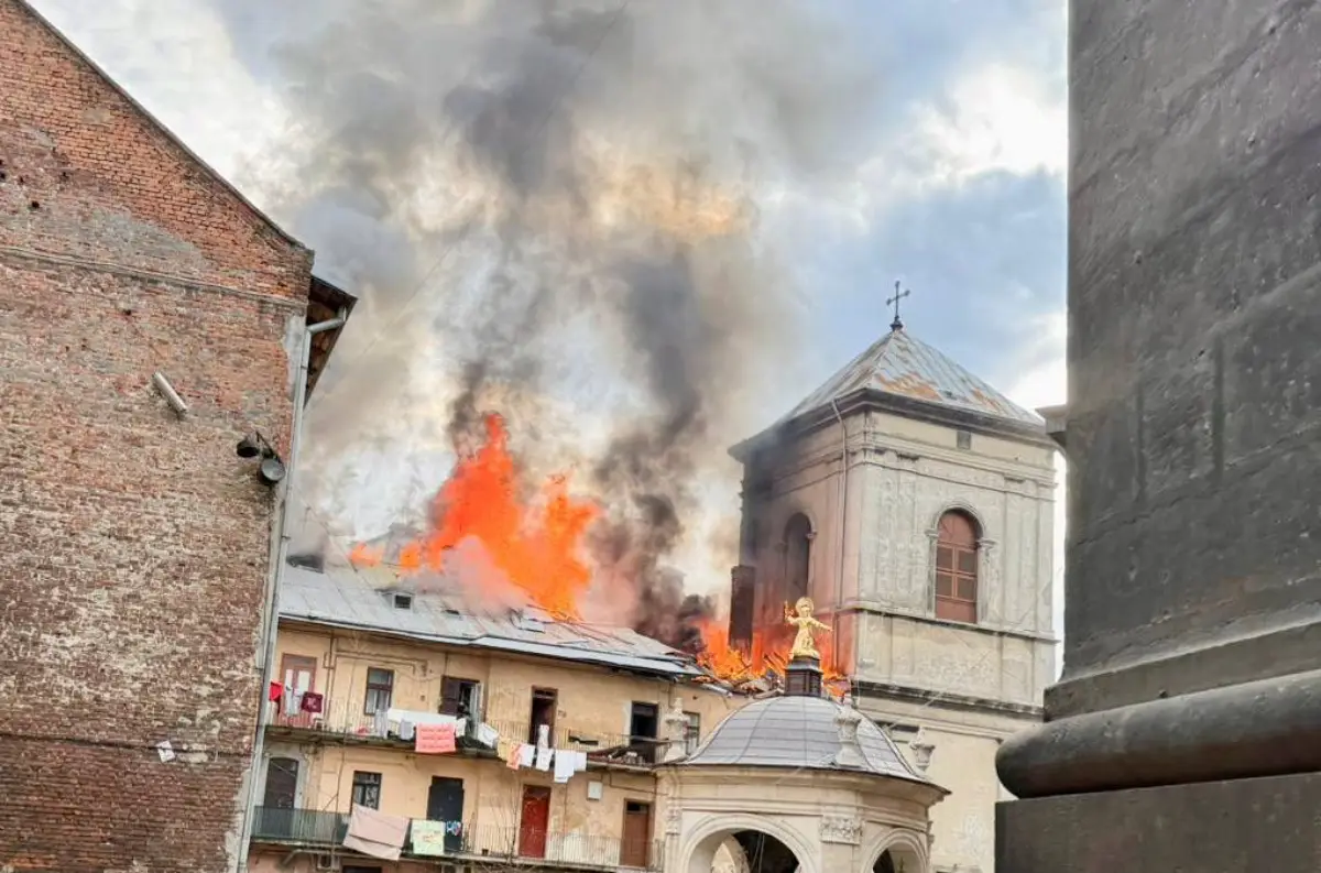Fire and thick smoke rise from historic buildings in Lviv’s UNESCO-listed old town after a drone strike