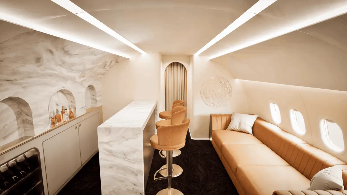 Magnifica Air Unveils Its First Aircraft – An Airbus Acj321Neo With Luxury Amenities 4 Magnifica Air Airbus ACJ321neo onboard lounge with marble bar counter, leather sofa seating and luxury private class cabin design