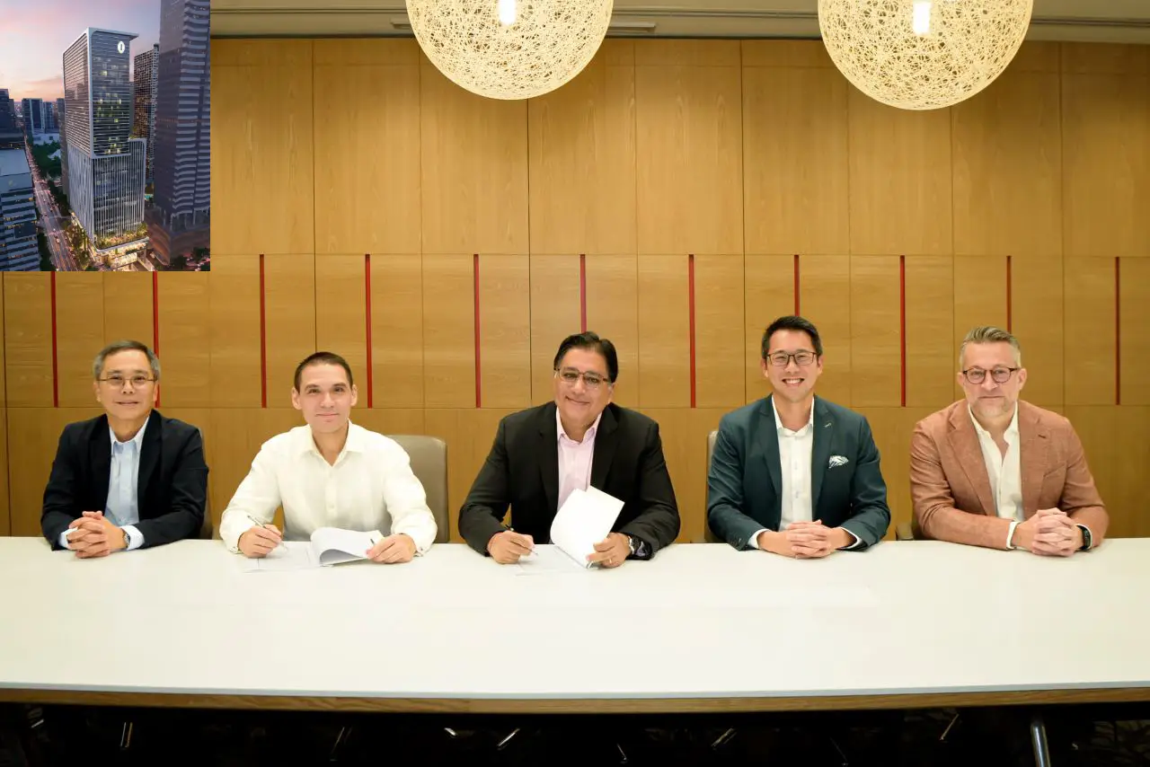 Hotel signing at a conference table