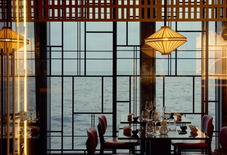 Luxury cruise ship restaurant with ocean views and Japanese-inspired design