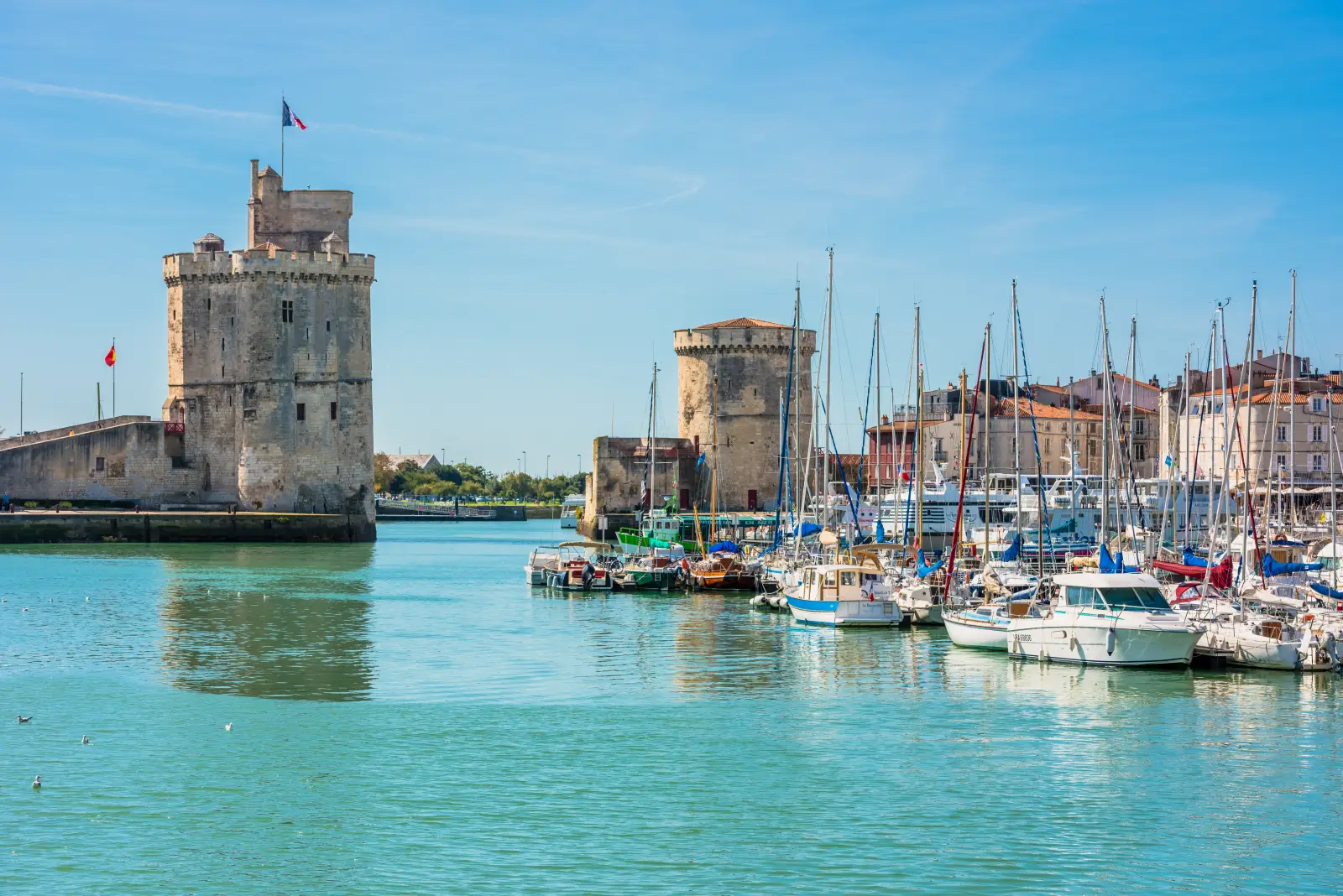 La Rochelle old port with medieval towers and sailing boats on the Atlantic coast of France