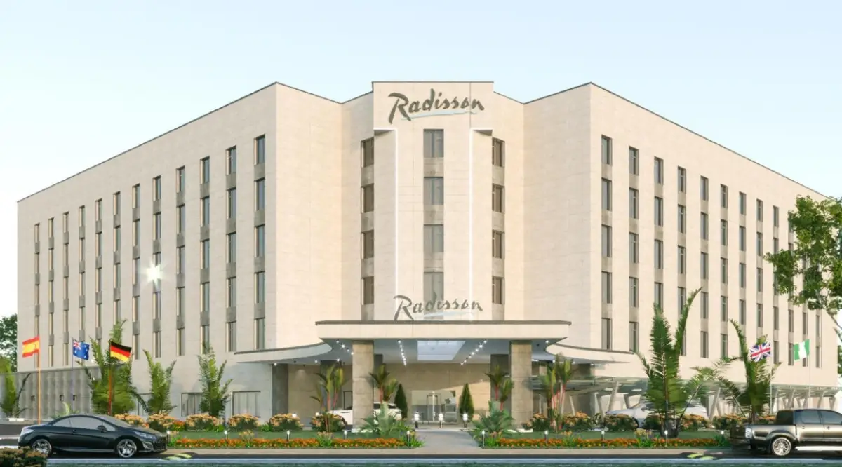 Radisson hotel exterior in Africa with modern facade and landscaped entrance