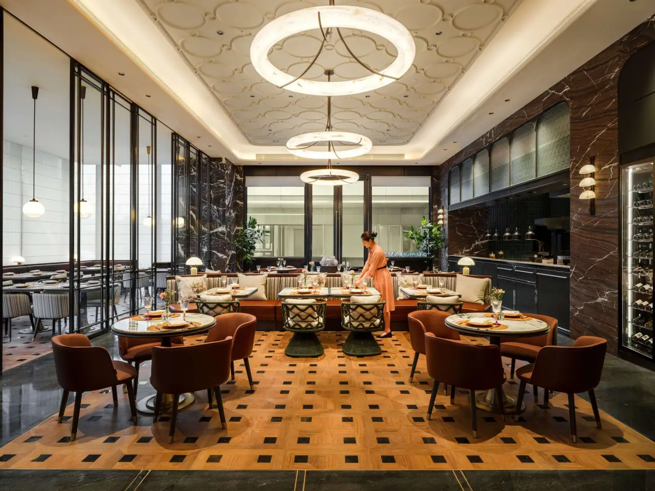 Accor Opens Its 800Th Hotel In China With Sofitel Changzhou Hi-Tech District 5 Elegant restaurant at Sofitel Changzhou with modern interiors, marble finishes, warm lighting, and stylish seating arrangement