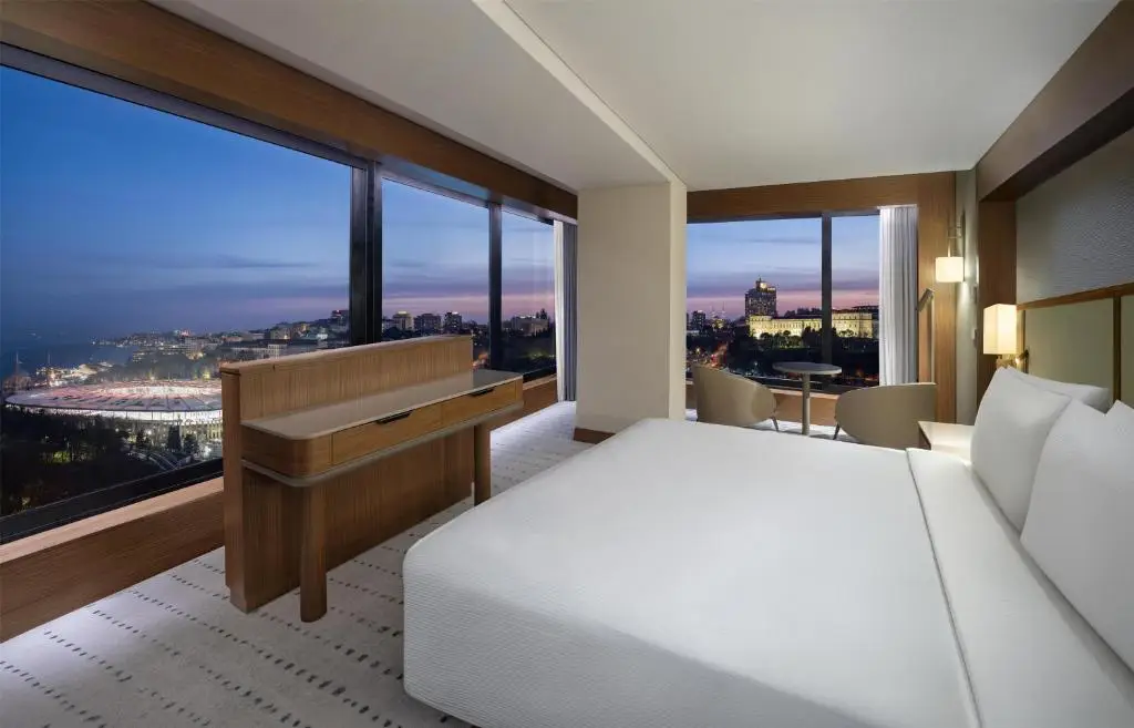 Istanbul Leads Europe In New Hotel Openings For 2026 4 Modern guest room at DoubleTree by Hilton Istanbul Maçka with panoramic Bosphorus and city skyline views at sunset