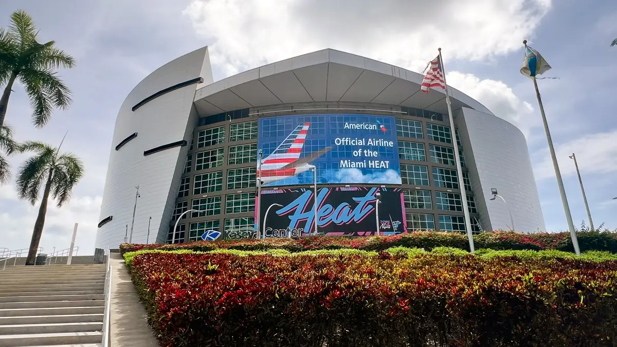Exterior view of Kaseya Center in Miami featuring American Airlines and Miami HEAT partnership branding on the arena facade