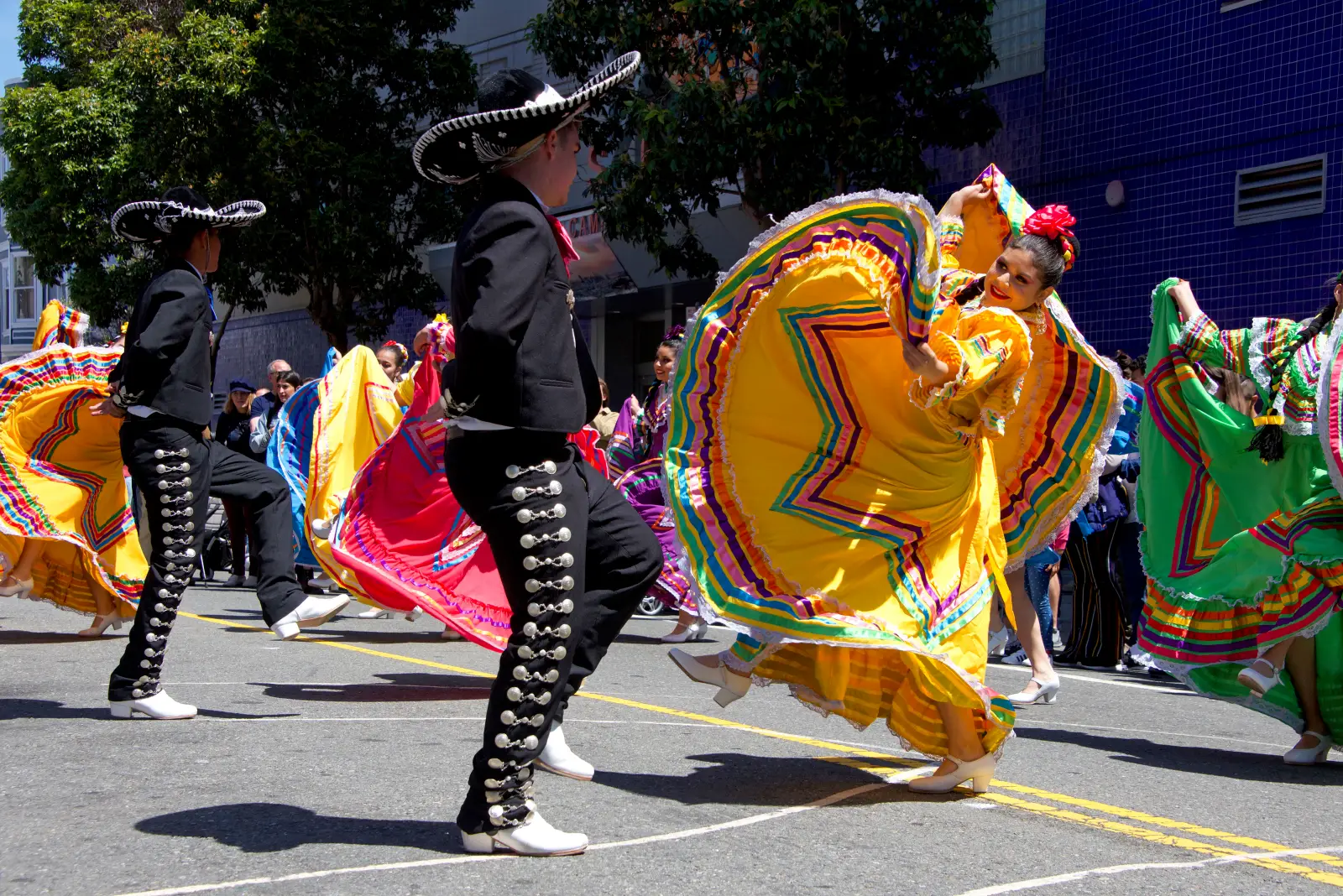 Ballet folklórico dancers perform at a Cinco de Mayo street celebration in San Francisco