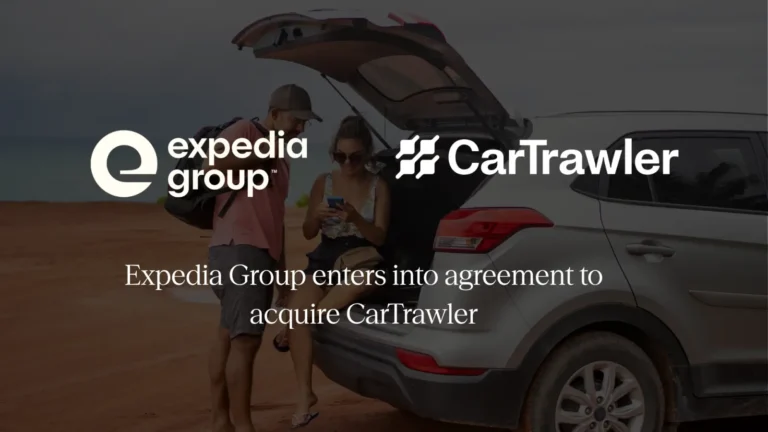 Expedia Group and CarTrawler logos displayed side by side over a background image of two travellers using a smartphone beside a car, announcing Expedia Group's agreement to acquire CarTrawler