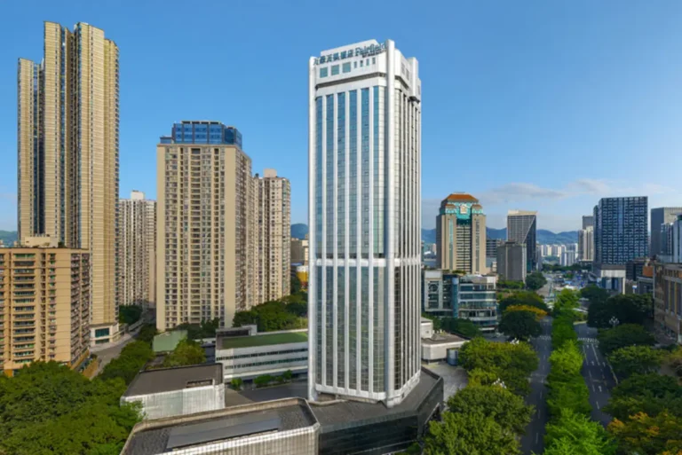 Exterior view of Fairfield by Marriott Chongqing Nan'an District rising above the city skyline