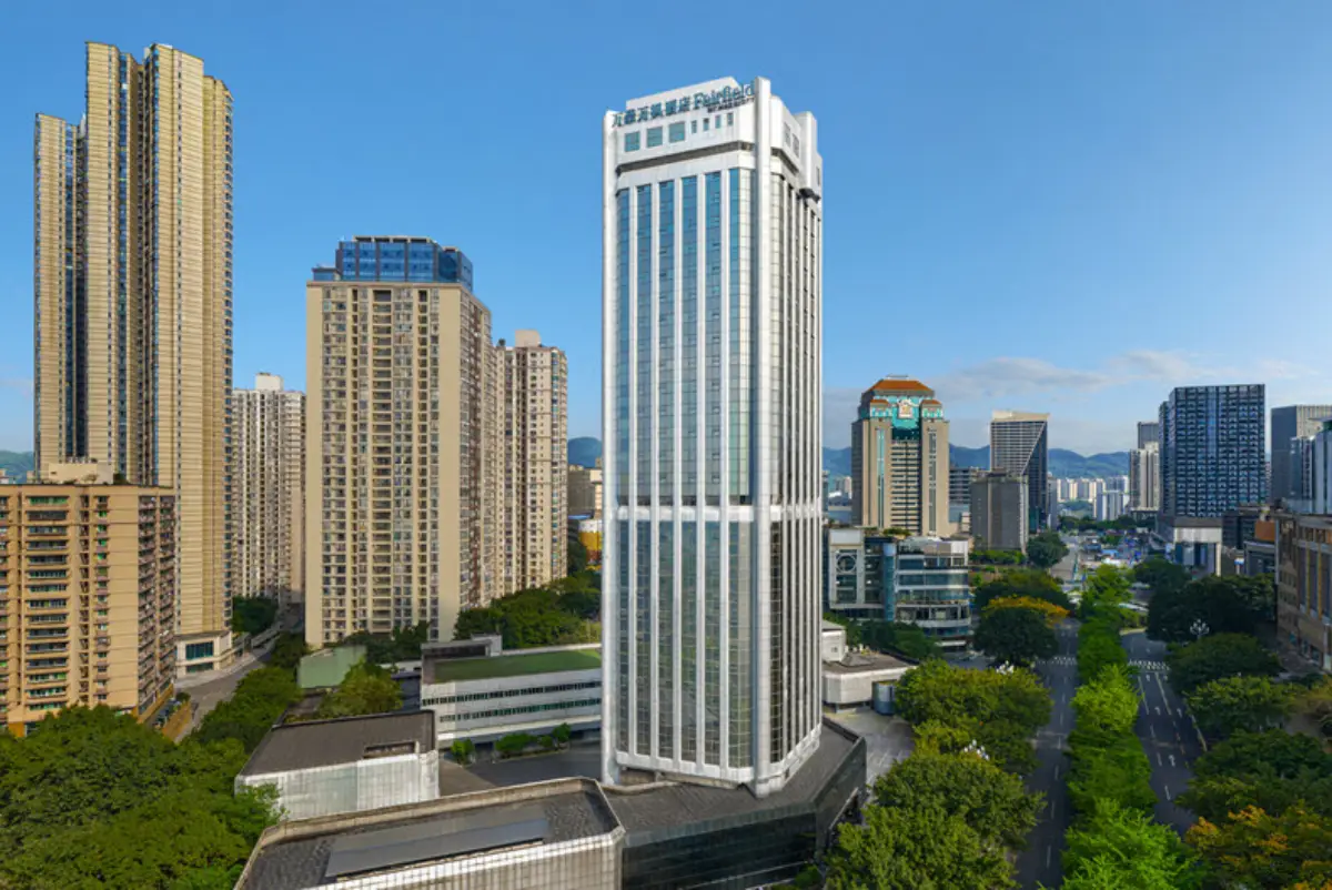 Exterior view of Fairfield by Marriott Chongqing Nan'an District rising above the city skyline