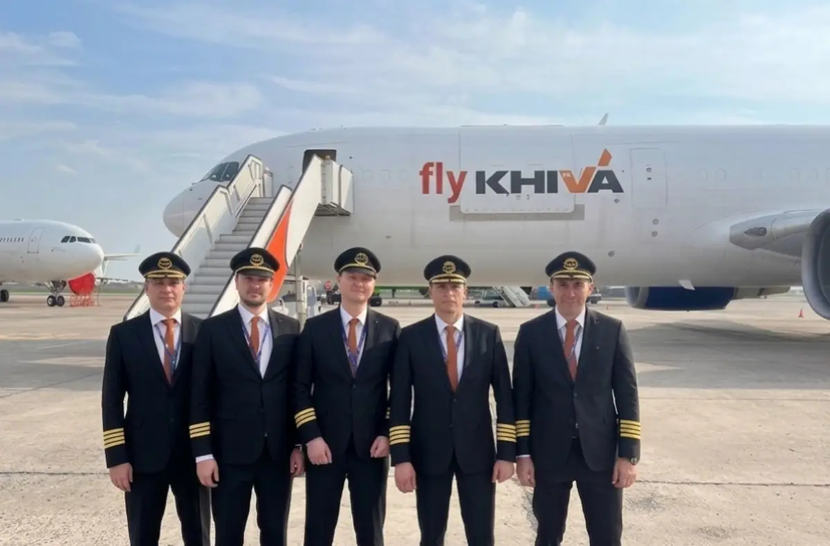 Fly Khiva flight crew standing in front of a Fly Khiva aircraft
