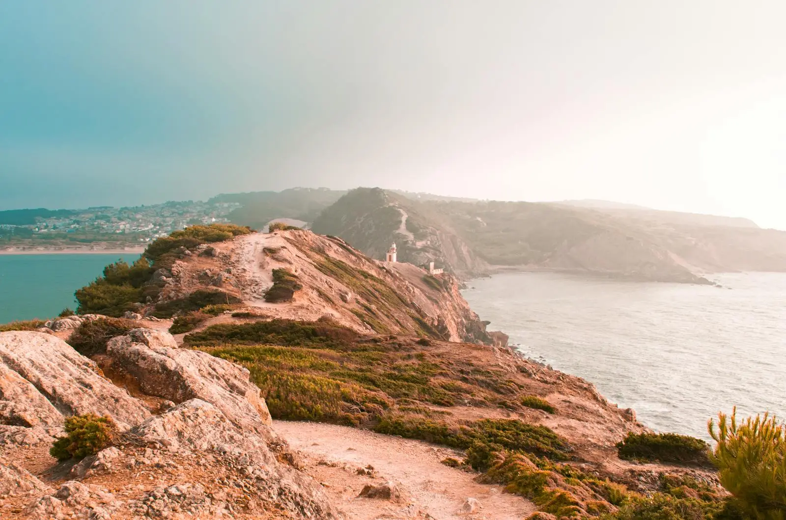 A hiker on a coastal trail along the Atlantic in Portugal