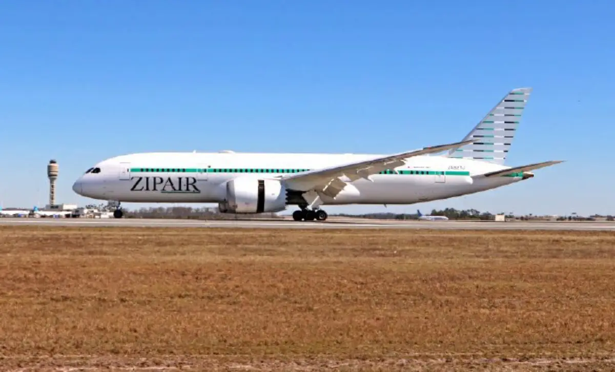 ZIPAIR Boeing 787 aircraft taxiing on the runway at Orlando International Airport during nonstop Tokyo service