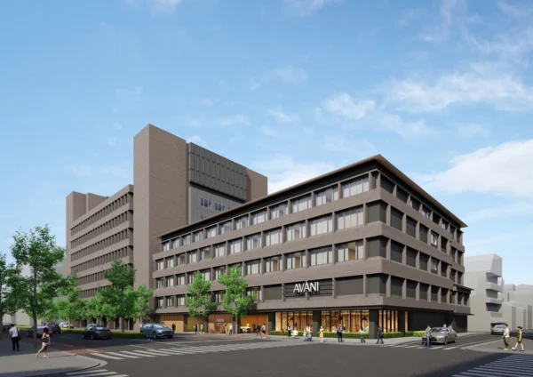 Home 7 Architectural rendering of Avani Kyoto, showing the future hotel's modern exterior on a central Kyoto street corner with pedestrian-friendly design and contemporary Japanese architecture.