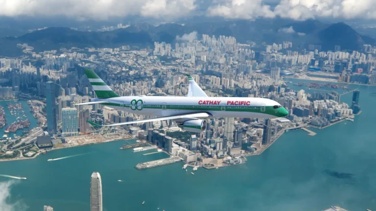 Aviation 11 Cathay Pacific aircraft flying over Hong Kong skyline during the airline’s 80th anniversary campaign