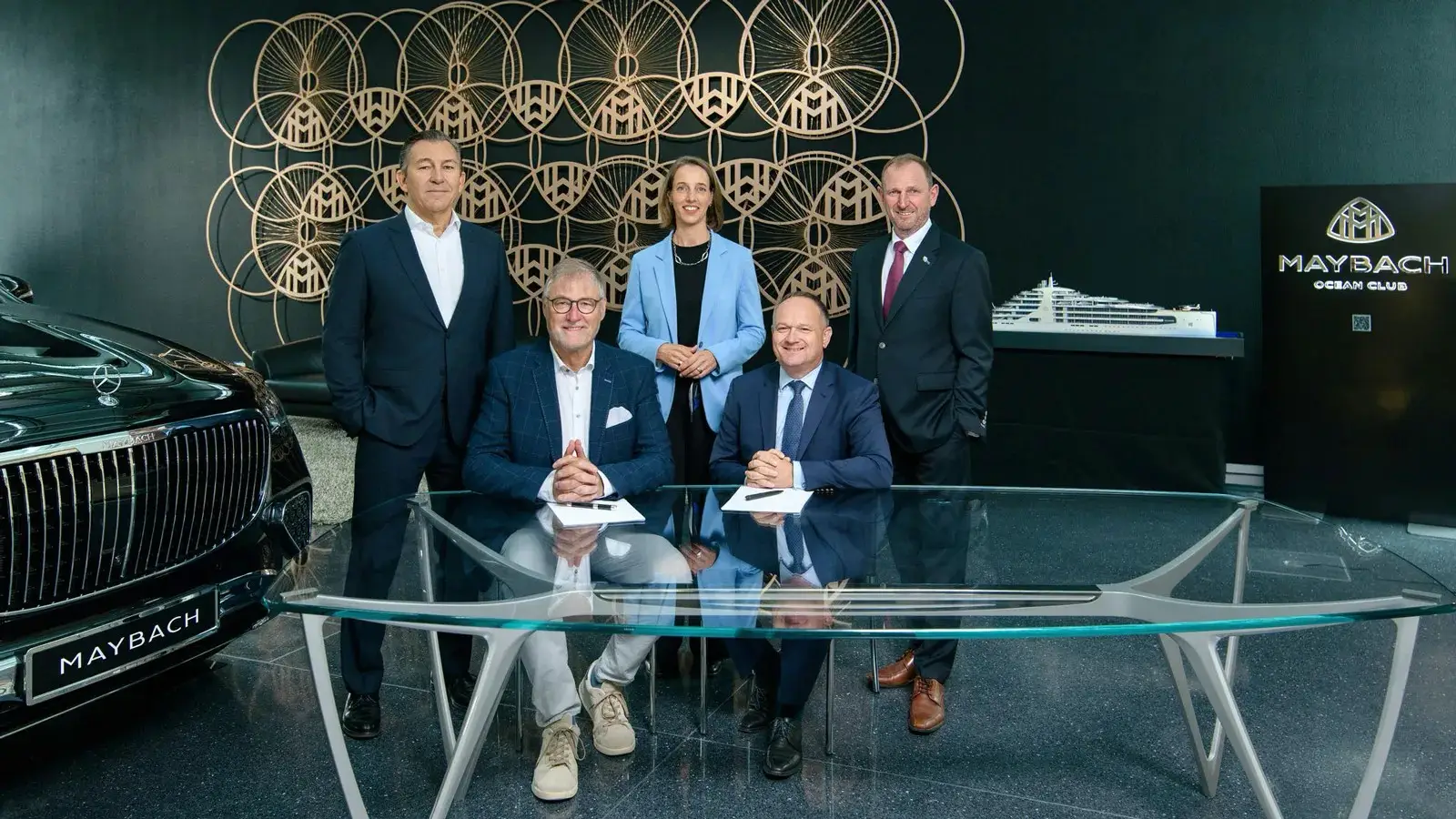 Executives from Maybach Ocean Club, Lloyd Werft and Mercedes-Benz Design at the signing ceremony for the Beyond Horizons superyacht project