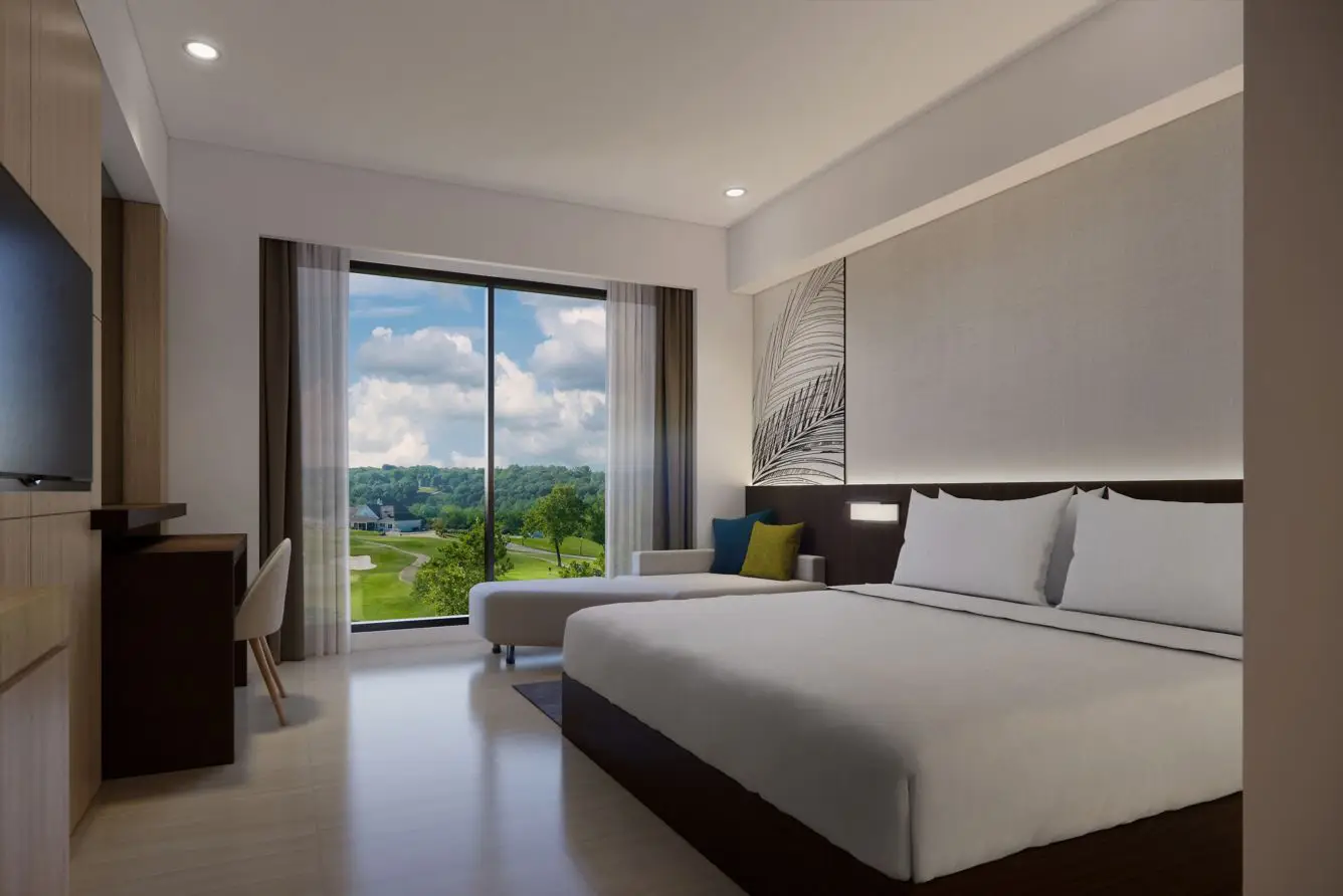 Courtyard By Marriott Debuts In Indonesia’s Sulawesi Island 3 Deluxe king room at Courtyard by Marriott Manado with garden view and modern furnishings