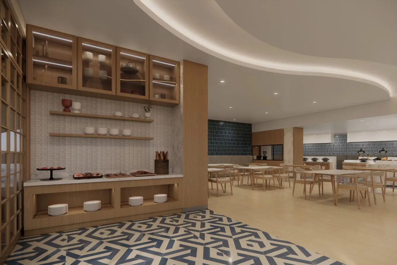 Courtyard By Marriott Debuts In Indonesia’s Sulawesi Island 4 All-day dining restaurant interior at Courtyard by Marriott Manado with buffet counter and wooden furnishings
