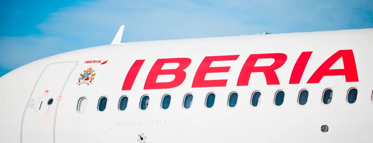 Pope Leo Xiv Flies Iberia To Barcelona For Sagrada Família Visit 3 Close-up of an Iberia Airbus A321XLR aircraft fuselage with airline branding at the airport