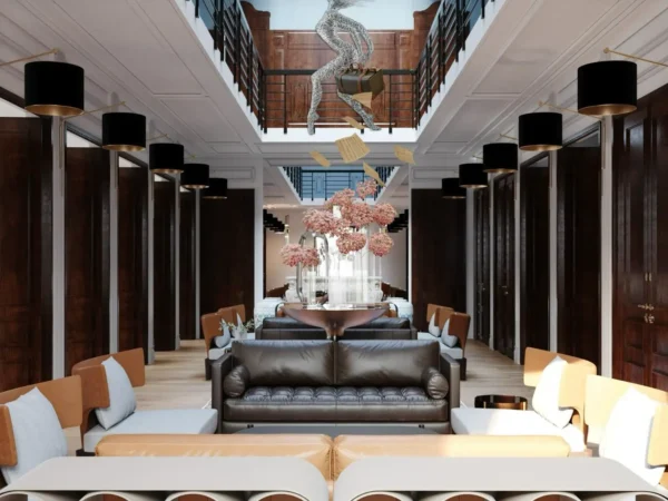 Interior lobby of L’Union Han Istanbul featuring restored historic architecture, contemporary furnishings and a suspended art installation.